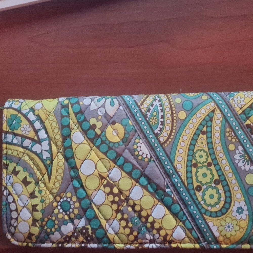 Vera  Bradley travel wallet , lemon parfait approx. 4"×8 1/4" and will hold alot
